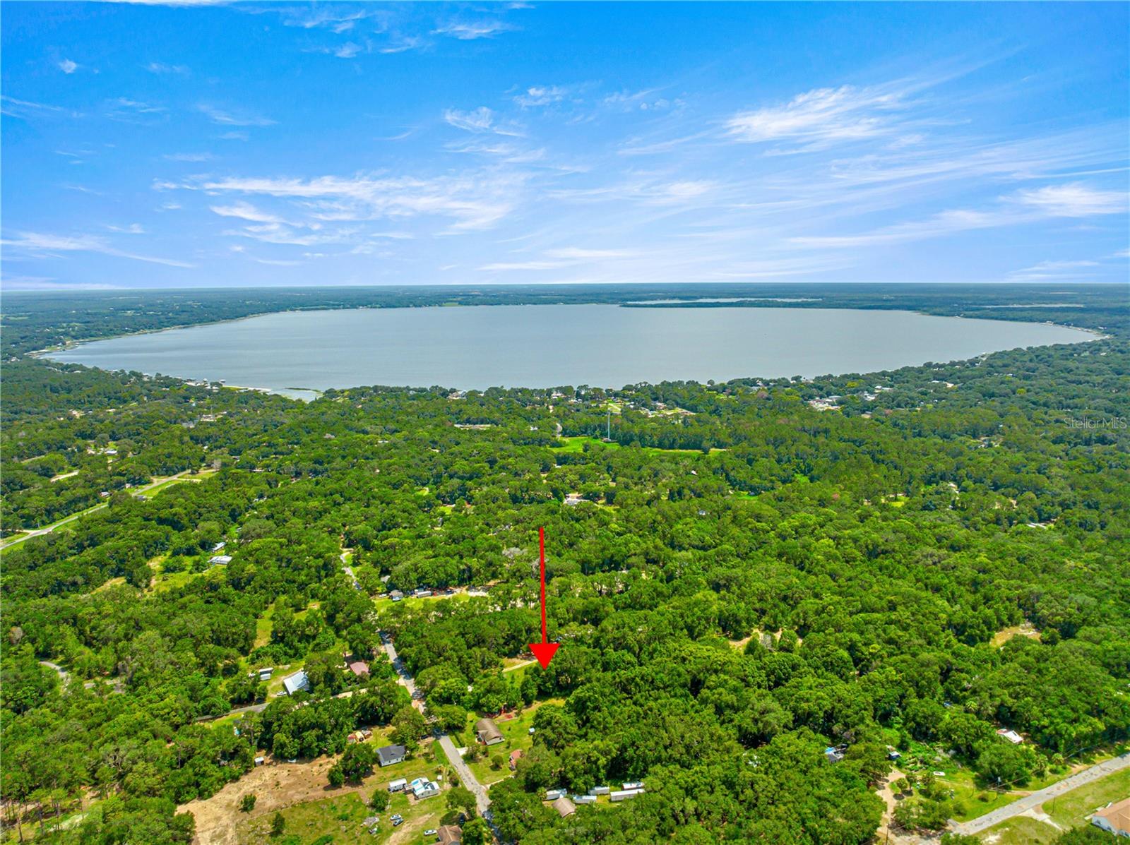 Over half an acre of opportunity, just five minutes from Lake Weir—this property offers the space and freedom
to build your vision with no HOA restrictions! Whether you’re looking for a peaceful retreat, a future homesite,
or a smart investment, this land delivers location and flexibility. Enjoy quick access to boating, fishing, and
lakeside dining, all while staying tucked away in a quiet, natural setting. —Don’t miss your chance to own a
piece of Florida living. Come take a look and imagine the possibilities!