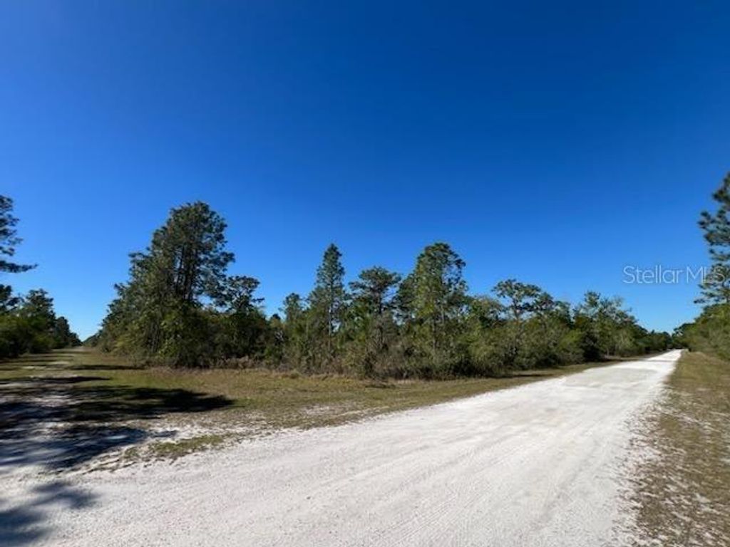 Photo of 623 Granada Drive, Indian Lake Estates, FL 33855 (MLS # TB8363244)