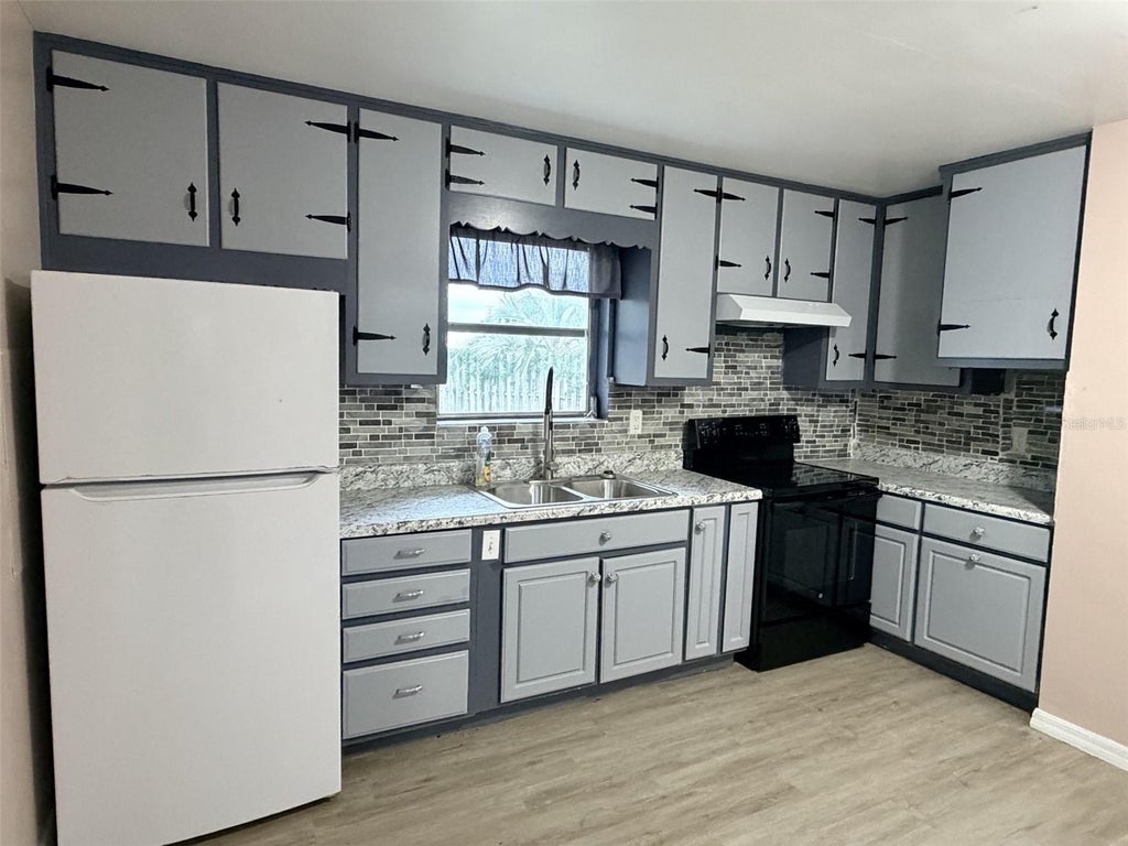Photo of 1025 NE 4th Street, Chiefland, FL 32626 (MLS # GC542828)