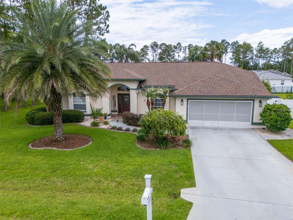 Photo of 29 Woodholme Lane, Palm Coast, FL 32164 (MLS # FC319274)