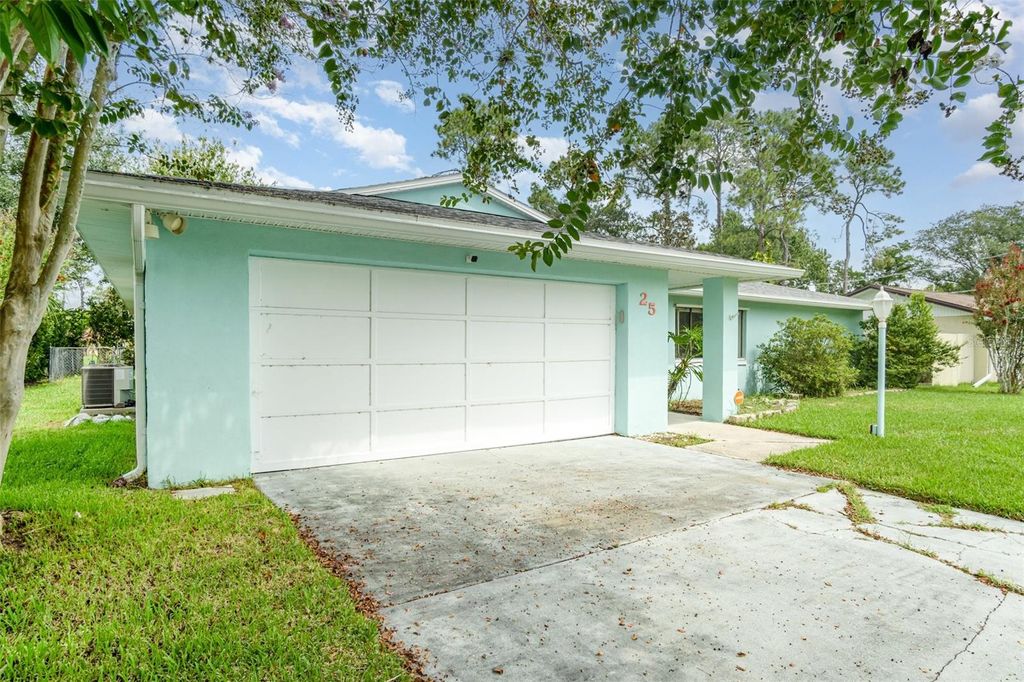 Photo of 25 Fillmore Lane, Palm Coast, FL 32137 (MLS # O6340329)