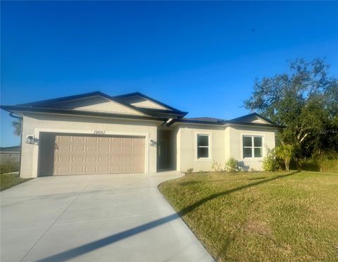 Photo of 19092 Woodbine Avenue, Port Charlotte, FL 33954 (MLS # C7509965)
