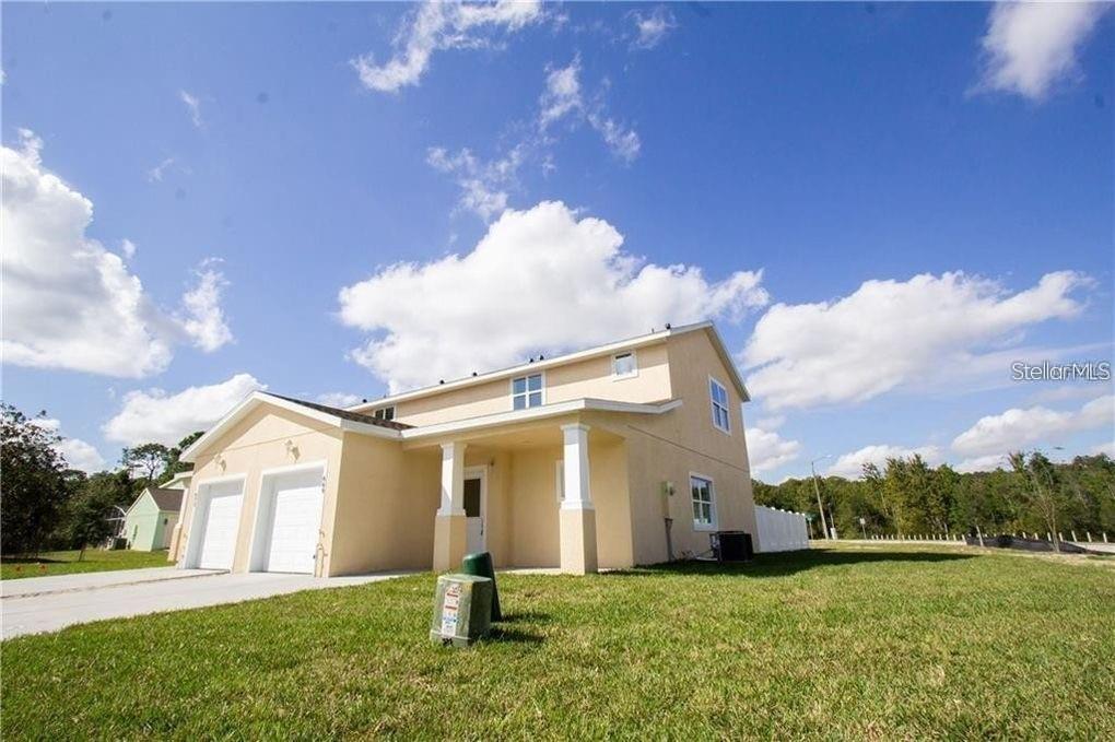 Photo of 669 Lake Shore Parkway, Davenport, FL 33896 (MLS # TB8545913)