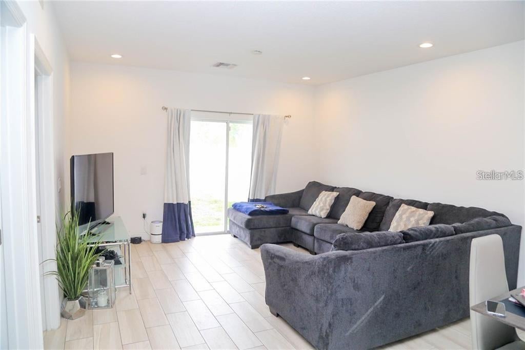Photo of 669 Lake Shore Parkway, Davenport, FL 33896 (MLS # TB8545913)