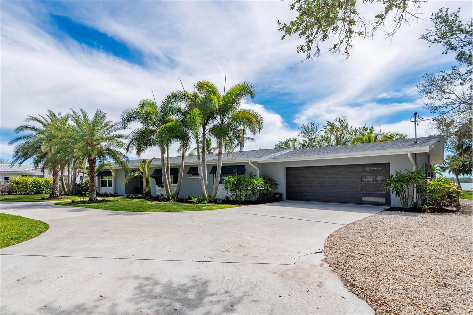 3 bedroom 3 bathroom direct GULF ACCESS pool home located in the Cape Haze community of Placida. This rare SW facing open water view home boast stunning sunsets with quick boat access to the gulf. As you enter the .88 acre property down the long concrete diveway you,ll notice an abundance of old growth live oak trees and manicured landscaping. Entering the home, your eyes are drawn to the open water views of the intercostal waterway and large pool area. The updated interior boast plank tile flooring throughout, quartz countertops and high end appliances. Recent upgrades include hurricane impact windows and doors, new seawall with composite dock with dual boat lifts, two new Air Conditioners and newer roof.