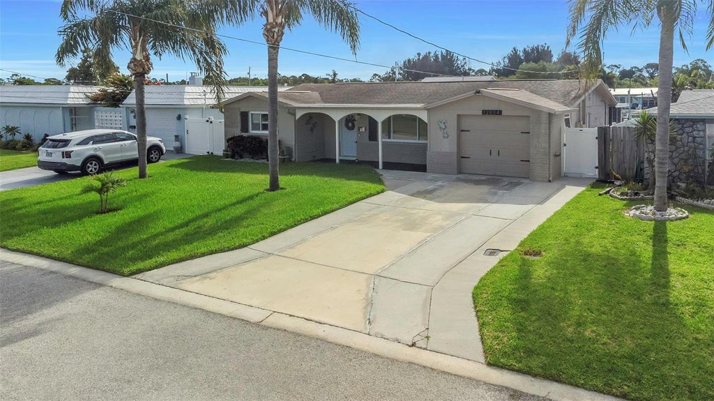 Photo of 12804 2nd Isle, Hudson, FL 34667 (MLS # TB8520573)