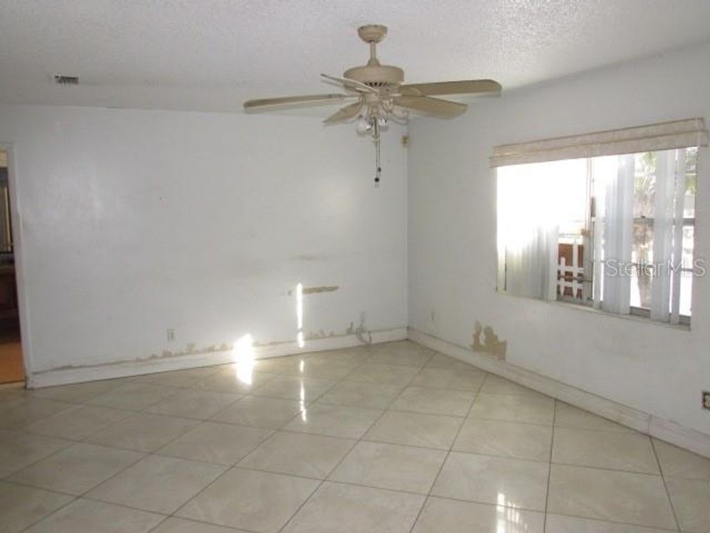 Photo of 7651 Rio Pinar Lakes Boulevard, Orlando, FL 32822 (MLS # S5143821)