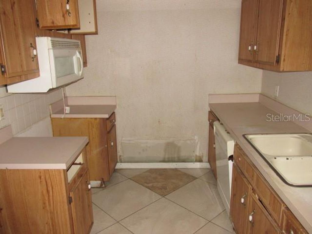 Photo of 7651 Rio Pinar Lakes Boulevard, Orlando, FL 32822 (MLS # S5143821)