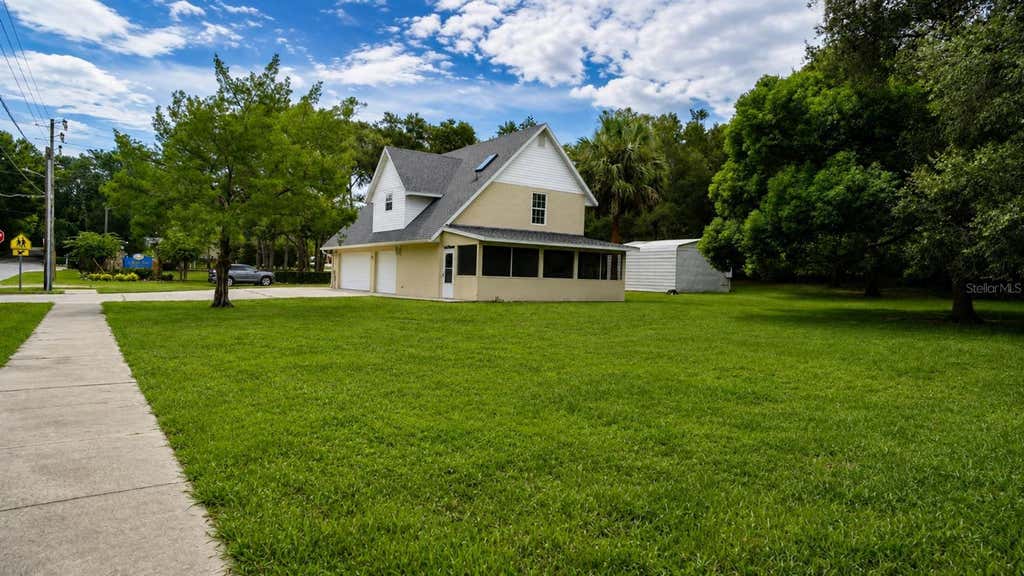 Photo of 420 E New Hampshire Avenue, Deland, FL 32724 (MLS # V4950888)