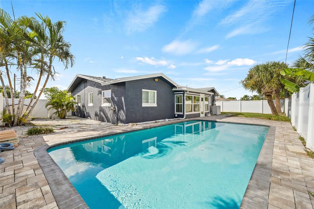 Photo of 10129 4th Street E, Treasure Island, FL 33706 (MLS # TB8425306)