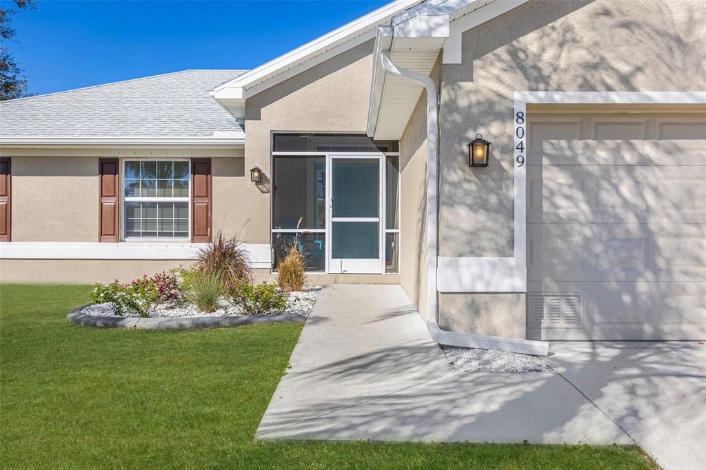 Photo of 8049 Dimstead Street, Port Charlotte, FL 33981 (MLS # D6145896)