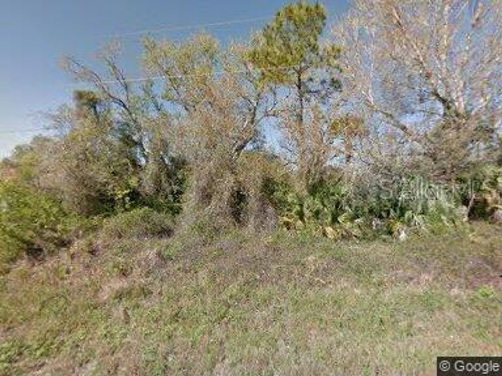 Photo of 658 Stanwin Loop, Lehigh Acres, FL 33972 (MLS # T3433121)