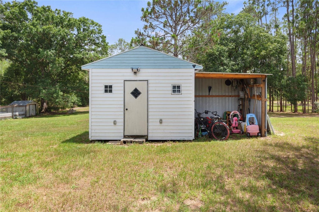 Photo of 5360 Dillman Lane, Polk City, FL 33868 (MLS # TB8520708)