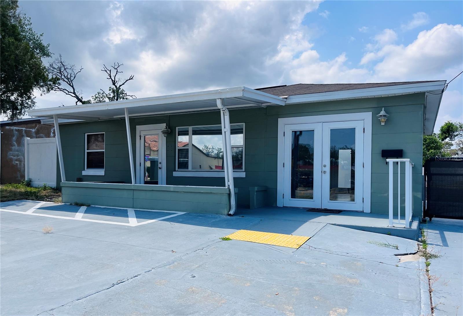 Versatile Professional Office Space Near Downtown New Port Richey. This well-situated office building offers a prime location just blocks from Morton Plant North Bay Hospital and the heart of Downtown New Port Richey, making it an ideal choice for a medical, legal, real estate, or any professional office setting. Upon entry, you're welcomed by a spacious reception area that sets a professional and inviting tone for clients and visitors alike. The interior features three generously sized private offices, each offering ample space and flexibility to accommodate a variety of layouts and work styles. Beyond the interior, the property boasts an immense backyard with endless possibilities. Whether for expansion, outdoor meetings, or simply additional storage and utility space. With its flexible floorplan, desirable location, and professional atmosphere, this office building presents an exceptional opportunity for your growing business. Don't miss your chance to establish your presence in this vibrant and accessible area.