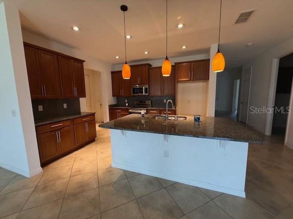 Photo of 1284 Bonita Canyon Drive, Poinciana, FL 34759 (MLS # S5152050)