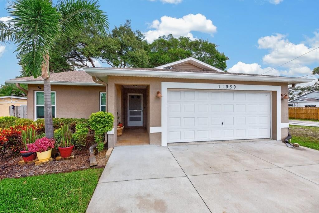 Photo of 11959 Murray Avenue, Seminole, FL 33778 (MLS # TB8550913)