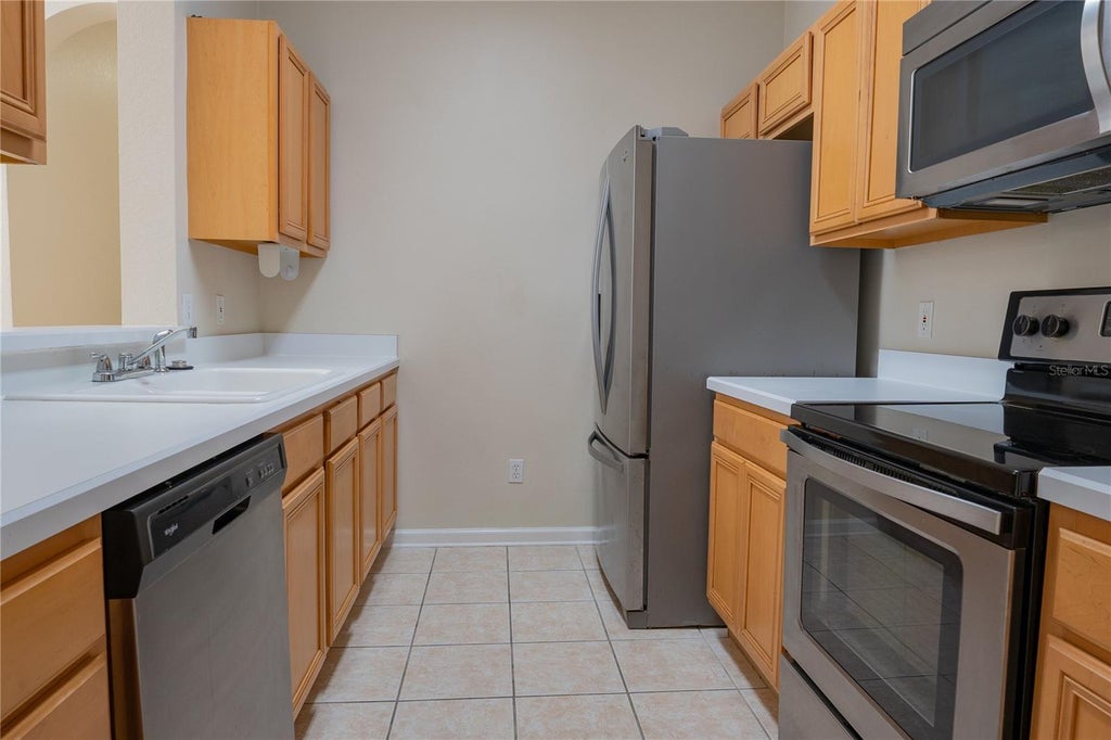 Photo of 13524 Turtle Marsh Loop #623, Orlando, FL 32837 (MLS # O6424338)