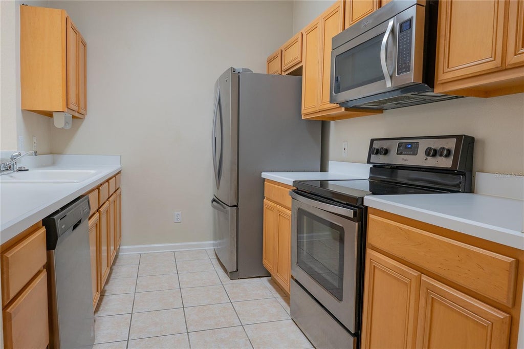 Photo of 13524 Turtle Marsh Loop #623, Orlando, FL 32837 (MLS # O6424338)