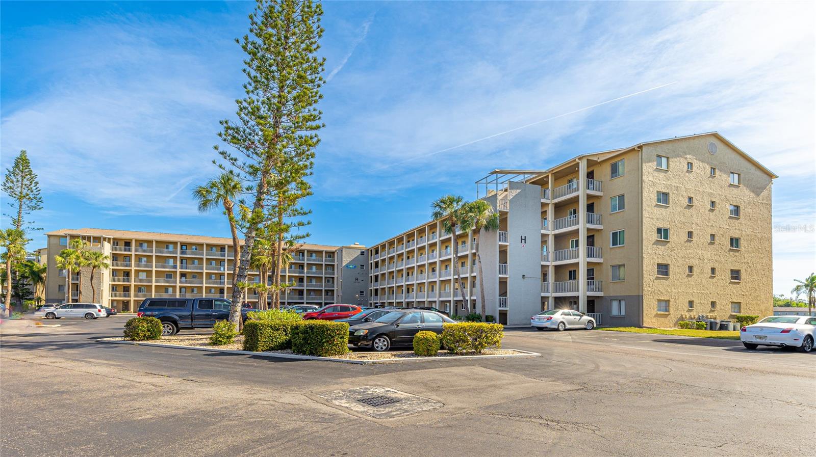 This move-in-ready condo is being sold as-is, offering endless opportunities to customize your own dream space. The spacious back porch extends across the entire length of the unit, providing a perfect spot to unwind while enjoying stunning lake views. Featuring 2 bedrooms and 2 full bathrooms, the home also boasts charming plantation shutters at the front. Conveniently located just 30 minutes from Anna Maria Island, 5 minutes from IMG Academy, and 15 minutes from the interstate, this central location offers easy access to everything you need.