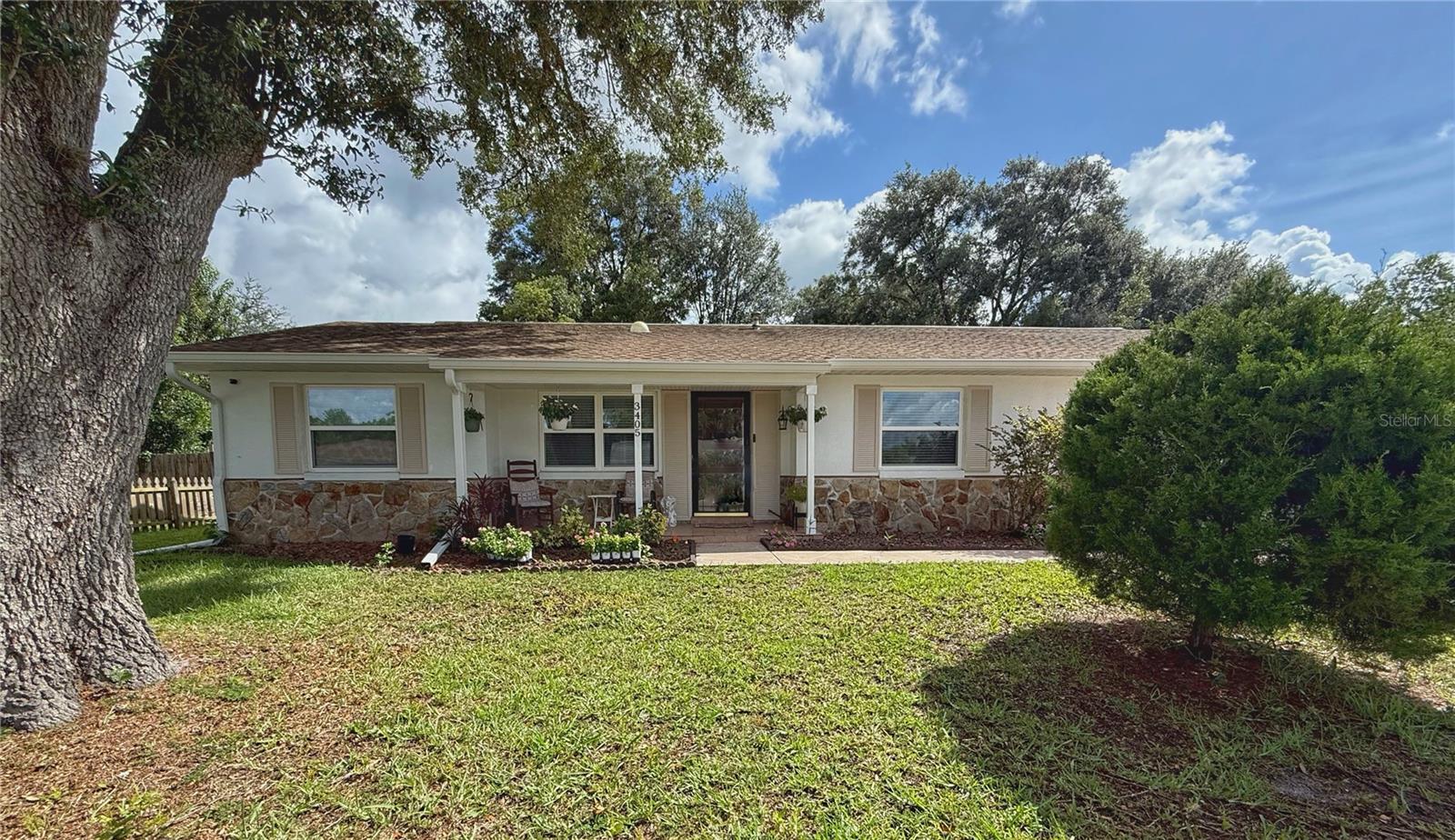 Welcome to this beautifully updated ranch style 2 bedroom, 2 bathroom home that blends comfort, style, and smart living. Step inside to discover a fully renovated kitchen featuring brand new appliances, a gas stove, and modern finishes that make cooking a delight. The bamboo flooring flows seamlessly throughout the home, complemented by fresh paint, updated fixtures, and new interior doors.
Both bathrooms have been tastefully renovated, offering a clean, contemporary feel. Enjoy year round relaxation in the four seasons lanai, perfect for morning coffee or evening unwinding.
This home is packed with smart upgrades including a Blink doorbell and camera system, smart thermostat, 2022 tankless water heater, 2022 HVAC system, and a 2022 upgraded electric panel. The 7-year-old roof provides peace of mind, and a brand-new 2025 vinyl privacy fence adds a fresh touch to the spacious backyard.
A detached workshop with electricity is ideal for hobbies, projects, or extra storage. Plus, enjoy the convenience of newer front-loading washer and dryer units. Schedule a tour today!