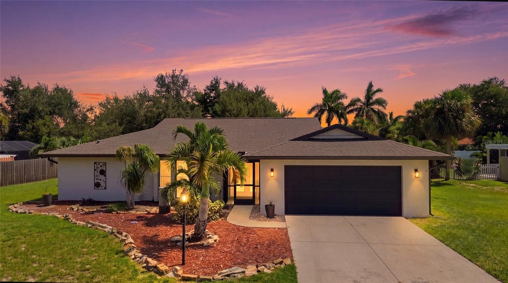 Photo of 432 S Shore Drive, Osprey, FL 34229 (MLS # A4703634)