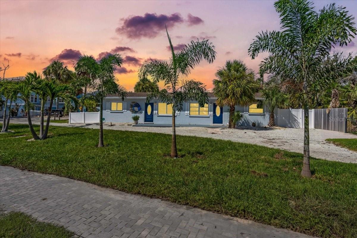 ZERO WATER INTRUSION!! High and dry from the recent hurricanes, this 2 bed 1 bath duplex offers the unique opportunity for an investor to have two income producing units in one of the most highly sought after areas on Anna Maria Island. The location puts you just 3 minutes away from the nearest beach access. Unit B offers new impact windows and vinyl flooring while unit A has kept the old Florida charm of inviting terrazzo floors. Ample outdoor space is perfect for al fresco dining after a long day at the beach. Here is your chance to own a rarely available ground floor duplex that received zero storm damage during hurricane Helene and Milton. Call today to schedule your private tour!