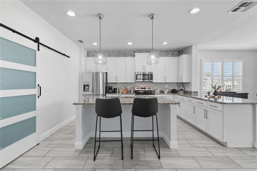 Photo of 133 Whirlaway Drive, Davenport, FL 33837 (MLS # O6377931)