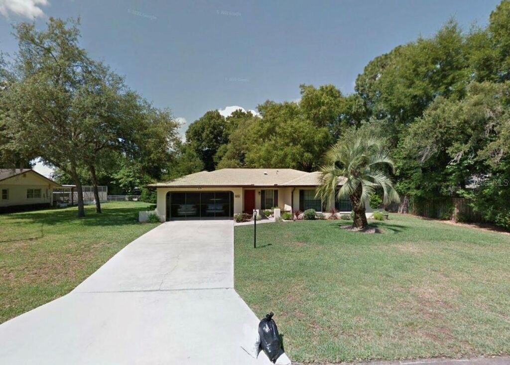 Photo of 8650 N Sarazen Drive, Citrus Springs, FL 34434 (MLS # A4659513)