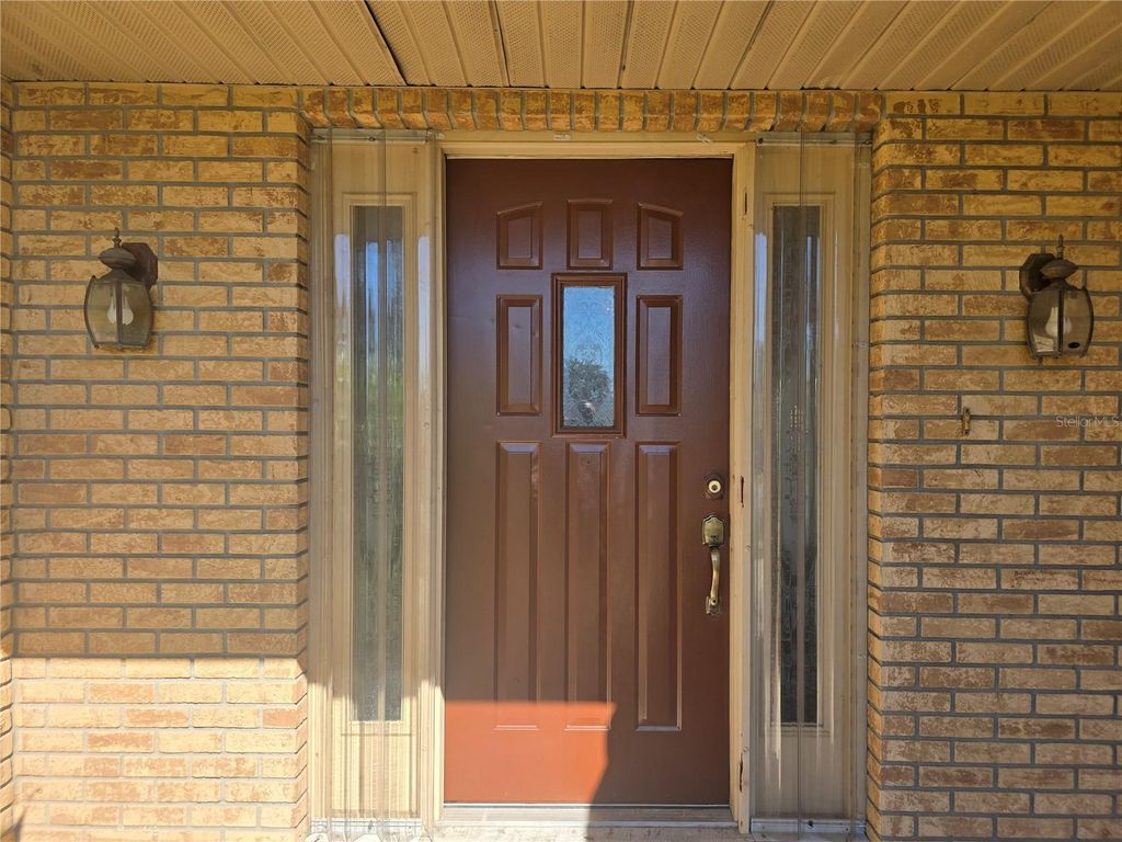 Photo of 707 Cambridge Way, Lake Wales, FL 33853 (MLS # P4937656)