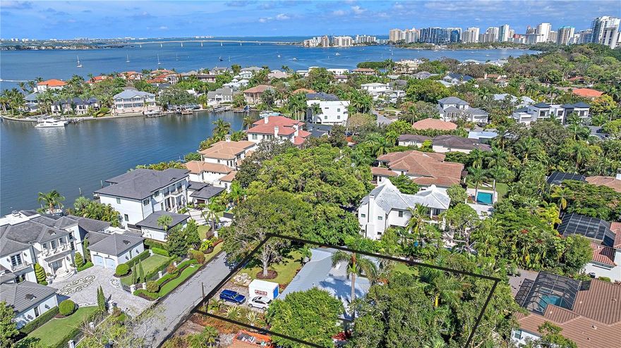 Harbor Acres –one of Sarasota’s most prominent residential neighborhoods, located on the shores of Sarasota Bay.  You will find this lot of almost 1/3 acre, close to everything Sarasota is known for: the islands with their sugar-sand beaches, exclusive shopping, restaurants, the arts, parks and so much more!  Homes are tucked away from traffic and noise on secluded streets, the perfect place to meet neighbors and walk your furry friends.  Plans for clearing the previous home are underway in preparation for the luxury home you have been dreaming of building.