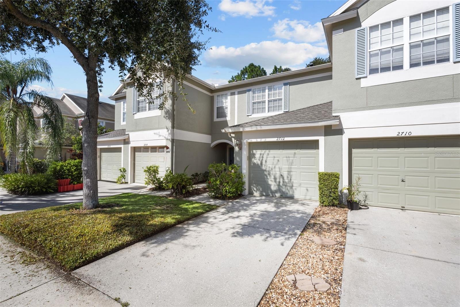 One or more photo(s) has been virtually staged. Welcome to this one-owner townhome in the sought-after gated community of Vista Cay—a home that’s been beautifully cared for and loved since day one. The moment you walk in, you’ll feel the warmth and care that has gone into keeping this home in pristine condition. This beautifully updated townhome located in the highly sought-after gated community of Vista Cay. Offering 2 bedrooms, 2.5 bathrooms, a versatile flex room, 1-car garage, and 1,574 sq. ft. of living space, this home blends comfort, convenience, and style whether you’re a first-time buyer, downsizing, or searching for a low-maintenance retreat. Recent upgrades include a brand-new 2025 roof (fully paid), fresh interior/exterior paint, and new carpeting throughout, giving you peace of mind.
The open layout is perfect for everyday living and entertaining, featuring a spacious kitchen, dining, and family room that flows out to a screened lanai with peaceful nature views. Upstairs, the large owner’s suite offers vaulted ceilings, a walk-in closet, and a refreshed en suite bath, while the second bedroom also includes its own full bath and walk-in closet. A flexible bonus room provides space for an office, playroom, or media room.
Vista Cay residents enjoy a gated entrance, sparkling pool, and pet-friendly walking paths—all just steps from guest parking. HOA dues cover water, trash, cable, pest control, yard maintenance, and sewage, making for stress-free, low-maintenance living. Location is unbeatable, with schools, parks, shopping, and dining nearby, plus easy access to downtown Tampa, MacDill AFB, and the Gulf beaches.
This well-maintained, loved, one-owner home is ready to welcome its next chapter—you!