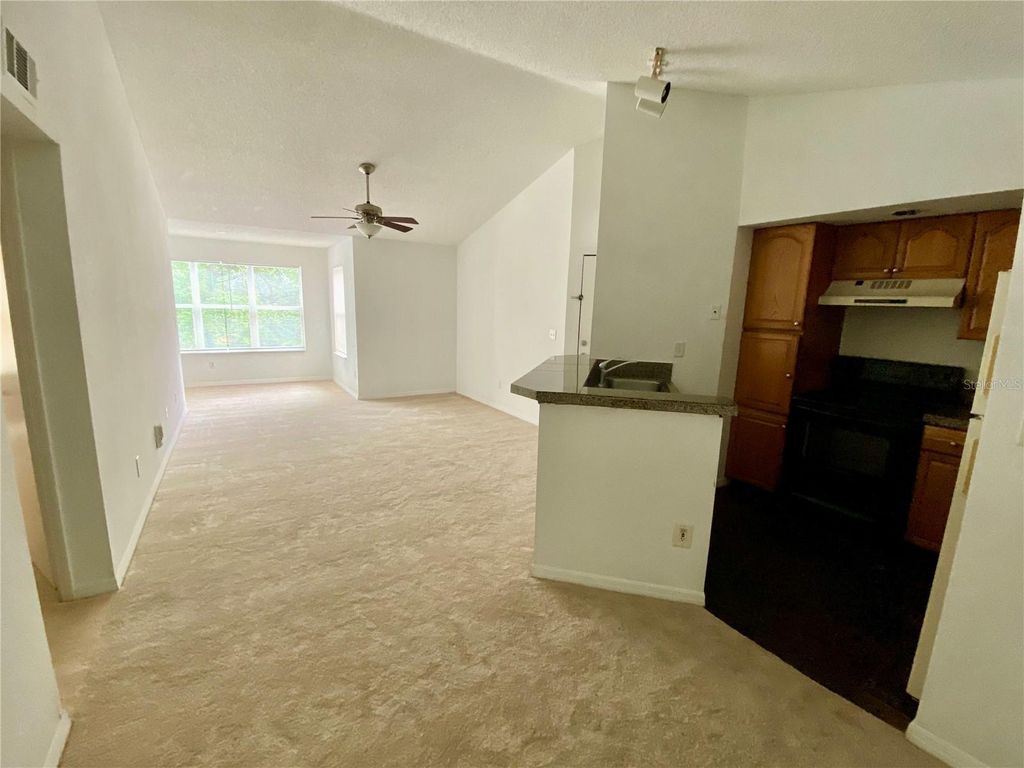 Photo of 4572 Commander Drive #1234, Orlando, FL 32822 (MLS # O6424050)