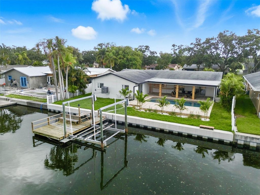 Photo of 1474 54th Avenue NE, St Petersburg, FL 33703 (MLS # TB8410717)