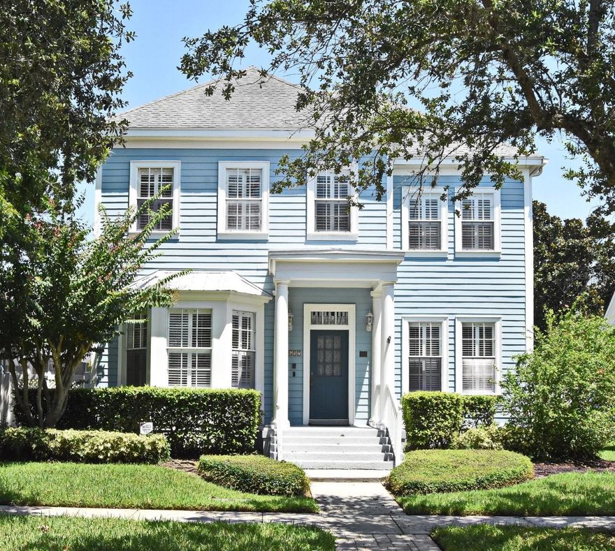 This David Weekly "Savannah" pool home sits on an oversized lot in the heart of Celebration. It’s a stunning property featuring spacious rooms, a large fenced and screened yard with a pool and spa, and a one-bedroom garage apartment above a 3-car garage, perfect for guests or as a rental opportunity. The grand foyer welcomes you with a living room showcasing bay windows on the left, and a formal dining room with a tray ceiling and chair rail on the right. Most windows are adorned with shutters. A flex space with French doors and built-in shelves can serve as a private study, den, or extra bedroom, conveniently located next to a full bathroom. The family room impresses with French doors, soaring ceilings, luxury vinyl plank flooring, and a fireplace. The chef’s kitchen is equipped with a large island, granite countertops, ample cabinetry, a kitchen nook, and a built-in desk. Home features crown molding throughout. A butler pantry and a laundry room with a sink add even more functionality. Upstairs, the primary suite offers a bright, spacious retreat with a bump-out for a desk or sitting area, an ensuite bath with double sinks, a garden tub, a shower, and a walk-in closet. Two additional bedrooms feature walk-in closets and share a full bathroom. The backyard is a private screened and fenced oasis, ideal for entertaining, swimming, or relaxing. The detached 3-car garage includes extra storage, and the garage apartment, accessible via an indoor staircase, features a bedroom, kitchen, and full bath. Located on Teal Avenue, one of Celebration’s original streets, this home is just steps away from restaurants, shops, and the charming small-town amenities the community offers.