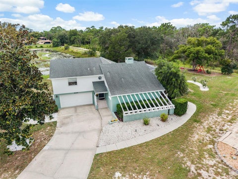 Photo of 8328 Dunnellon Road, Weeki Wachee, FL 34613 (MLS # TB8555611)