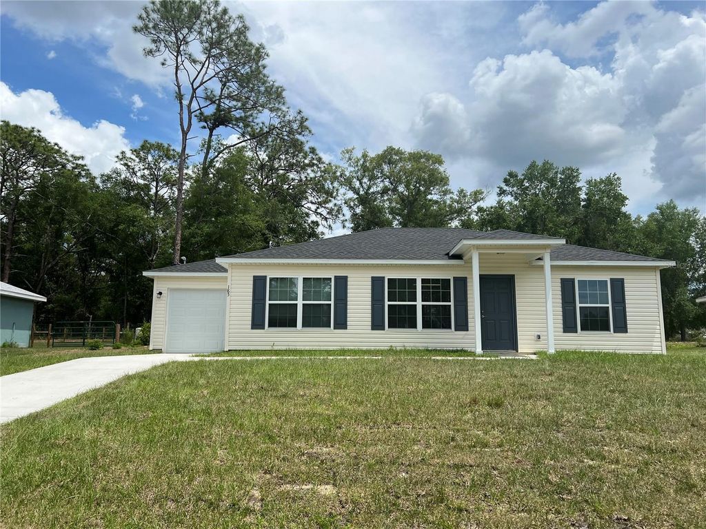 Photo of 185 Malauka Loop, Ocklawaha, FL 32179 (MLS # OM703656)