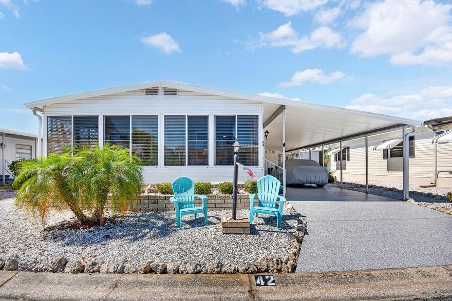 Welcome to Palma Sola Shores!  This land owned 55 and over park boasts 101 lots.  It is not only special due to it's desirable location next to Palma sola Bay and the the gentle breezes everyday but sits just minutes away between the roads that lead to the beautiful beaches including Bradenton Beach and Anna Maria Island.  This 2 bedroom 2 bath furnished home you will love from the minute you walk thru the door.  A newly updated kitchen with ample storage and counter space.  The large living area provides plenty of sitting area and the dining area provides character with the built ins for your unique choices of displays.  The enclosed front porch is exactly where you want to start your day with sunshine and fresh air.  It does get better, your going to find large bedrooms, large closets.  The guest bath is room and totally updated.  The Master bath is large, spacious and updated.  This place is loaded with character, updates and well cared for.  No hurricane damages and does not sit in a flood zone.  The low HOA of only 300.00 covers water, sewer, trash, cable and internet.  Enjoy sunsets at the community private dock with a fresh breeze provided for free everyday!  The community is quaint and very beloved by it's residents.  Dont miss out on this one of a kind opportunity!