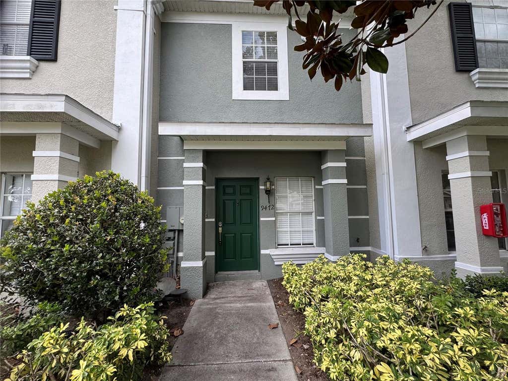 Photo of 9472 Flowering Cottonwood Road #77, Orlando, FL 32832 (MLS # O6432040)