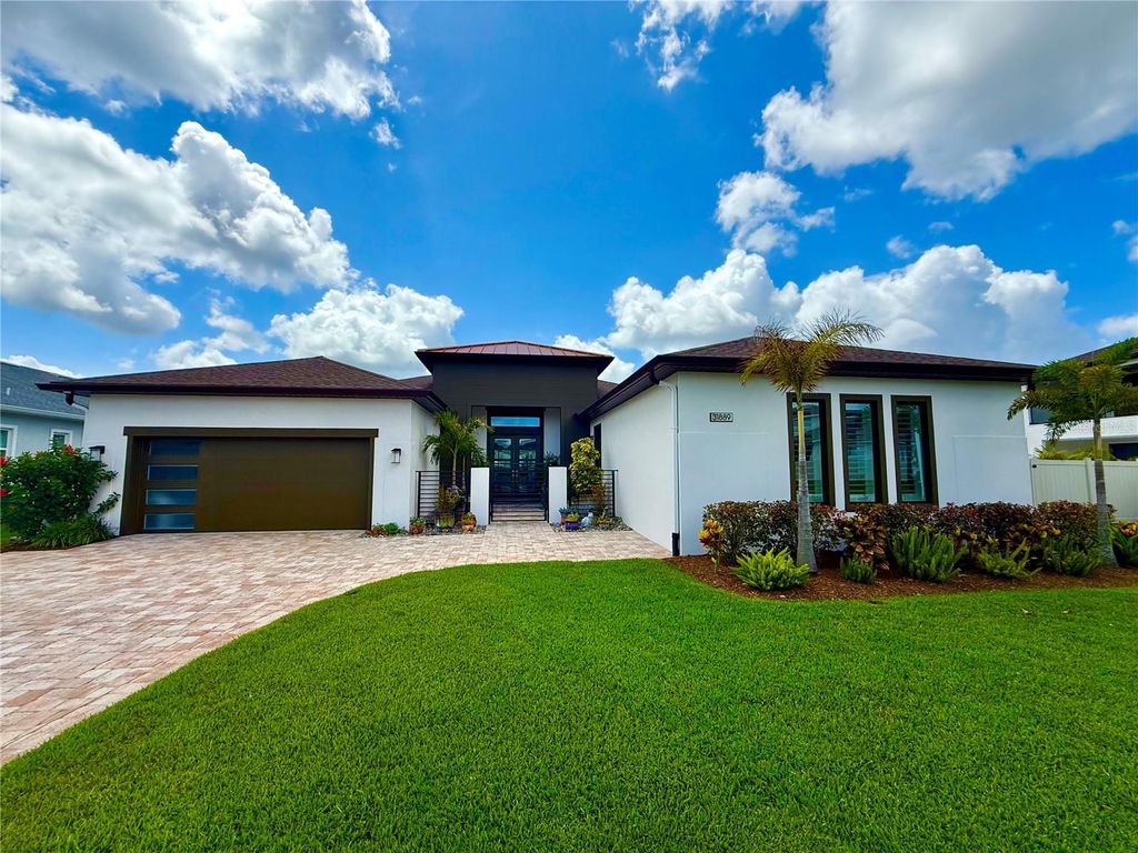 Photo of 31889 Tortuga Shore Loop, Wesley Chapel, FL 33545 (MLS # TB8400028)