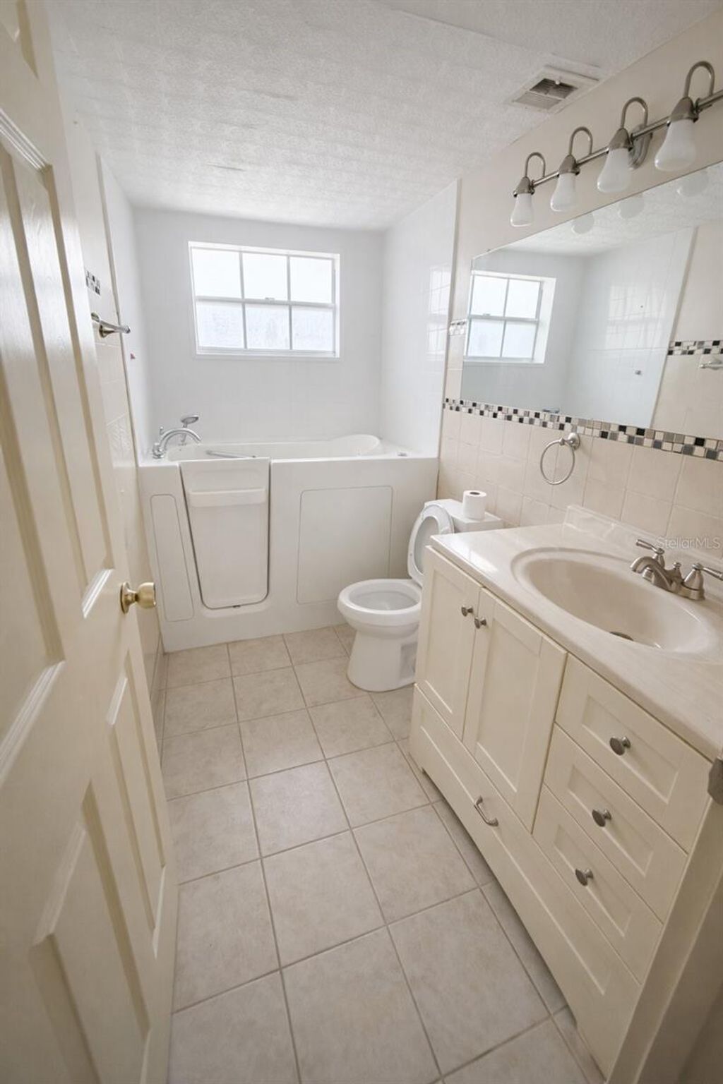 Photo of 8702 Village Mill Row, Hudson, FL 34667 (MLS # A4682759)