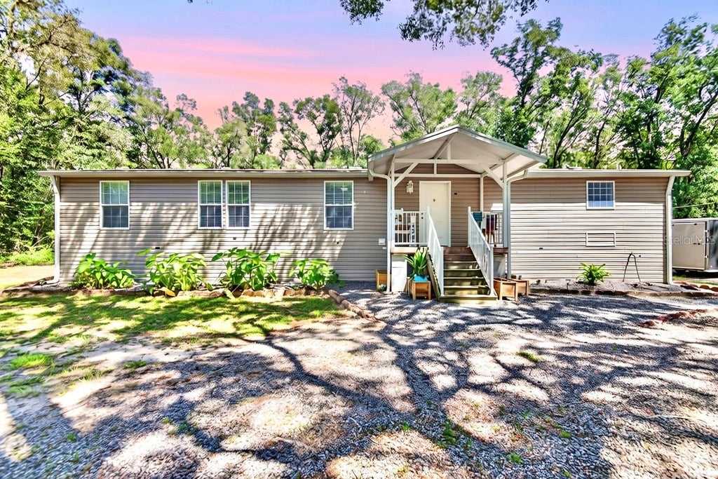 Photo of 21812 Field Of Dreams Lane, Dade City, FL 33523 (MLS # TB8545279)
