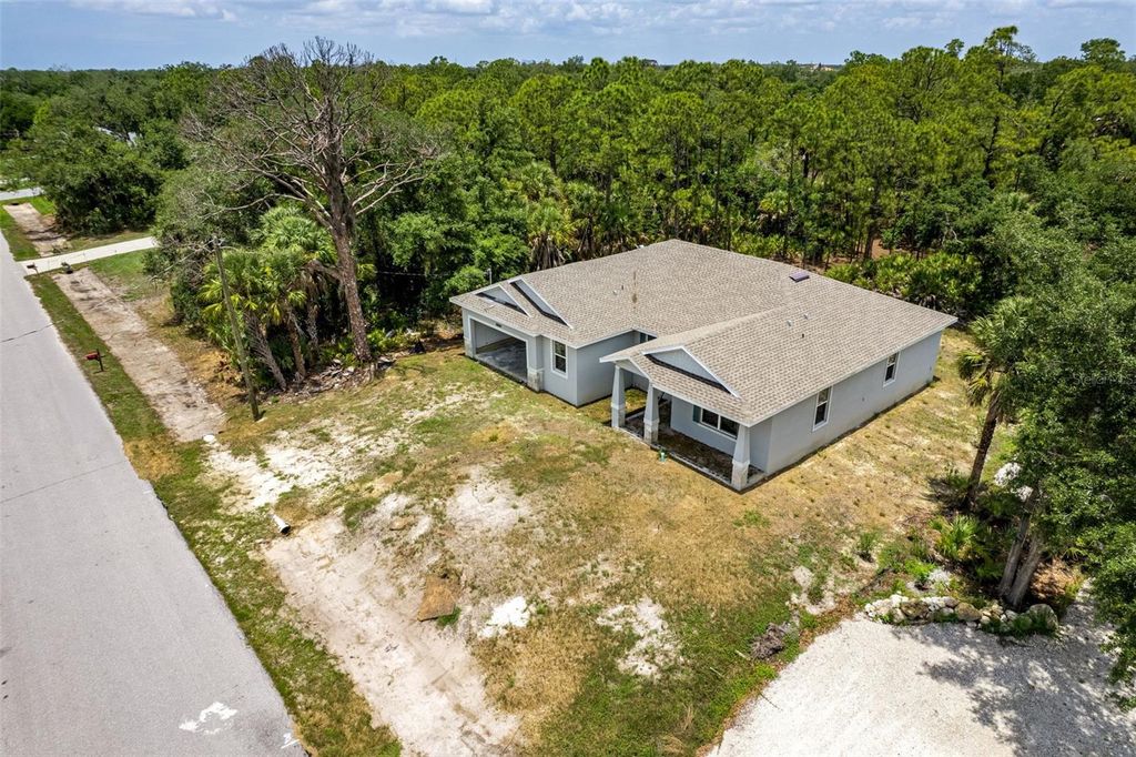 Photo of 15084 Mcgraw Avenue, Port Charlotte, FL 33953 (MLS # C7527244)