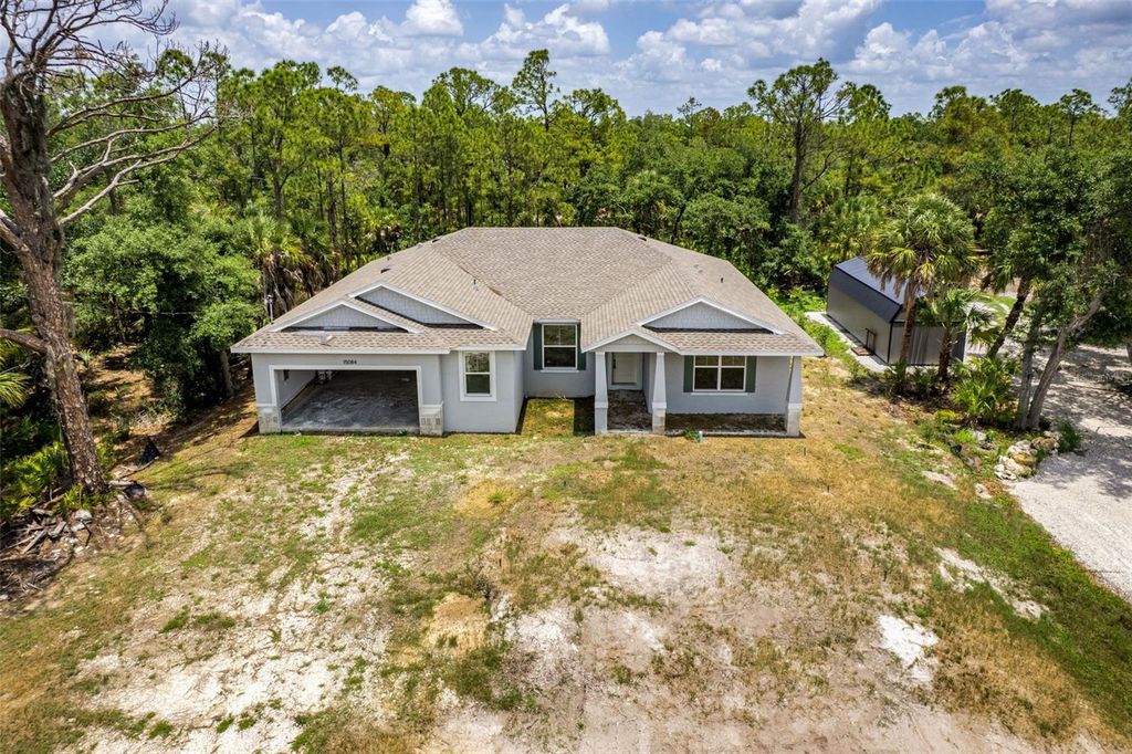 Photo of 15084 Mcgraw Avenue, Port Charlotte, FL 33953 (MLS # C7527244)