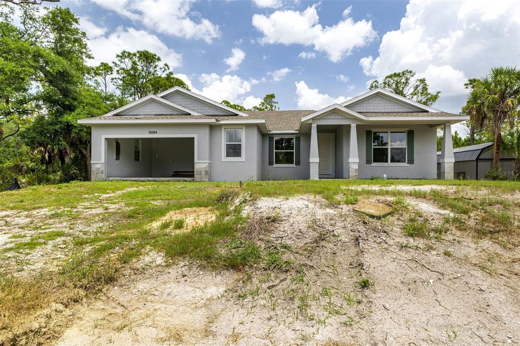 Photo of 15084 Mcgraw Avenue, Port Charlotte, FL 33953 (MLS # C7527244)