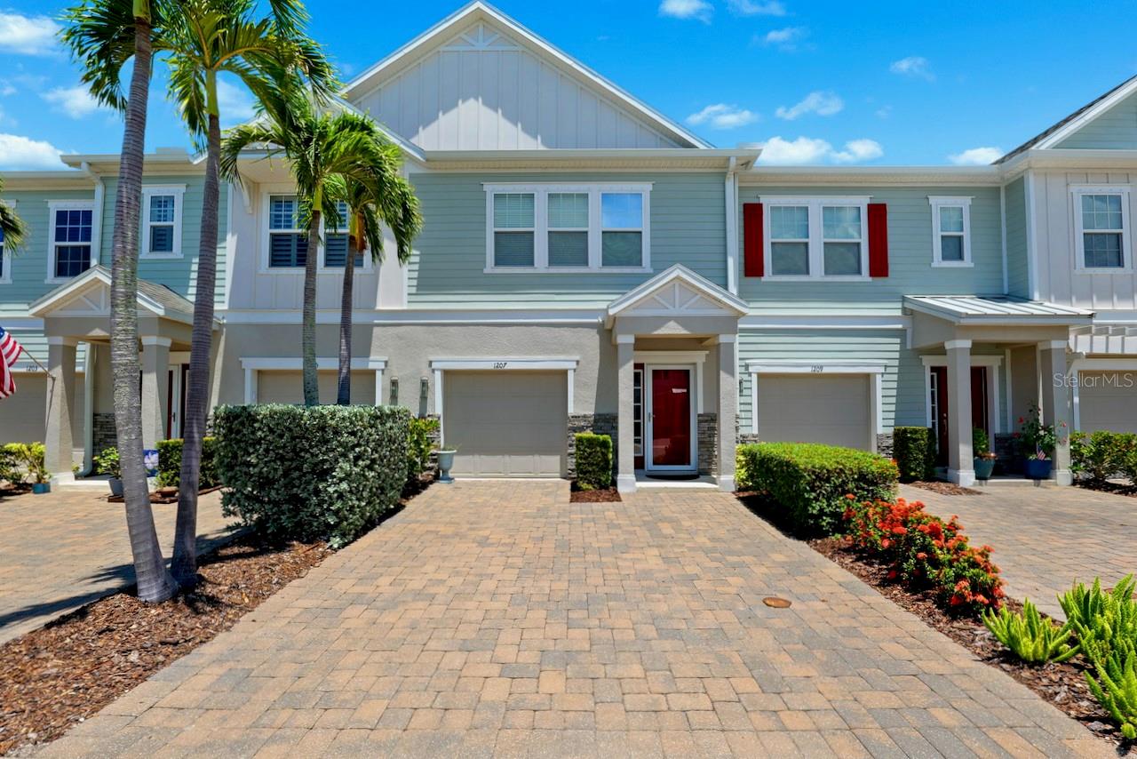Welcome to Aqua Solis in highly sought-after and walkable Dunedin, awarded one of the Best Small Towns to Live in the US by Travel + Leisure. This upgraded, 2018 built townhome boasts charming Key West style architecture and is ready for its lucky new owner. Located in a non-flood zone and only 1 mile from the heart of downtown Dunedin, this premier location is a best kept secret. This residence is tucked away on a quiet cul-de-sac and has serene wooded backyard views with no rear neighbors- one of the best locations in the neighborhood. Step inside to find an open concept living space with airy, high ceilings, and plank style flooring, an ideal space for both relaxation and entertaining. The modern kitchen features espresso cabinets, sleek granite countertops, stainless steel appliances, tile backsplash, under cabinet lighting, a large island and ample storage space. A 3 panel slider leads to your private lanai. Just imagine sipping your morning coffee as sunlight welcomes the start of a new day in this relaxing space. Upstairs, retreat to the spacious primary suite, with a spa inspired ensuite bathroom and walk in closet. Highlights include a semi-frameless shower and quartz countertops. 2 additional bedrooms, guest full bath and laundry room complete the second floor. 1 car garage plus double spaced paver driveway. This home is Energy Star rated, resulting in lower utility bills and improved comfort. Enjoy low maintenance living with a very low HOA fee. When it’s time to relax, take a dip in the pool or enjoy a short golf cart or bike ride to scenic Edgewater Drive along the waterfront to capture an incredible sunset. Aqua Solis is a picturesque, gated community with amenities including a pool, dog park and community trail. Located in the golf cart zone and close to the Pinellas Trail, hospital, Blue Jays spring training stadium and just 1 mile to historic downtown Dunedin’s charming shops, restaurants, parks, weekly farmers market, and popular arts and music festivals. Paradise awaits at award winning nearby beaches including Honeymoon Island, Clearwater Beach and Caladesi Island. This coveted location is just a 30 minute drive to 2 international airports as well. Whether for your primary home or a seasonal escape, this home presents an unparalleled opportunity for Florida living at its finest. Your opportunity awaits to call this exceptional property your own!