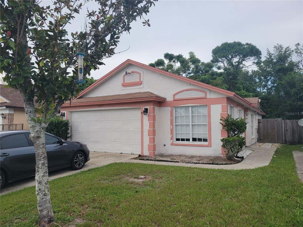 Photo of 9827 Dean Cove Lane, Orlando, FL 32825 (MLS # O6435143)