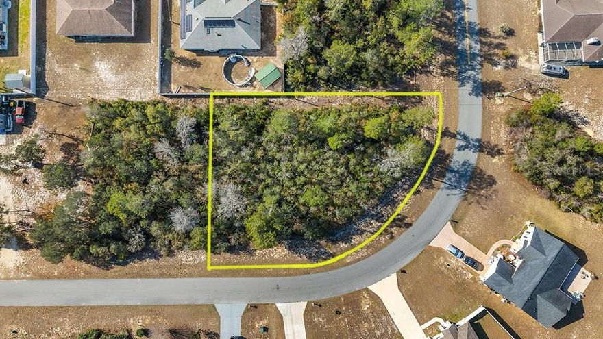 Right around the corner from the golf course!  The corner lot is ready to go!  Build your dream home!  Area served by county water...no well needed!