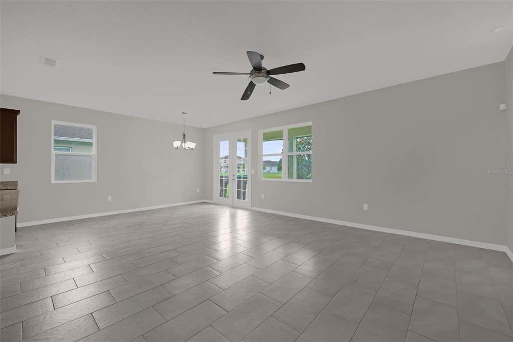 Photo of 12112 Carson Drive, Orlando, FL 32824 (MLS # O6430569)