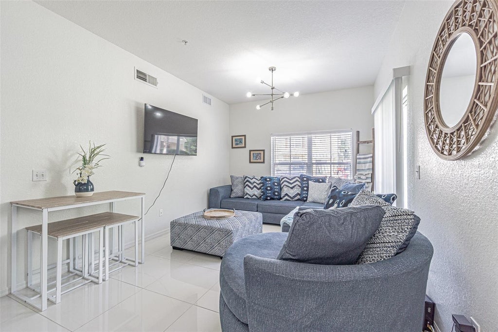Photo of 4001 Santa Maria Drive #107, Kissimmee, FL 34741 (MLS # G5118237)