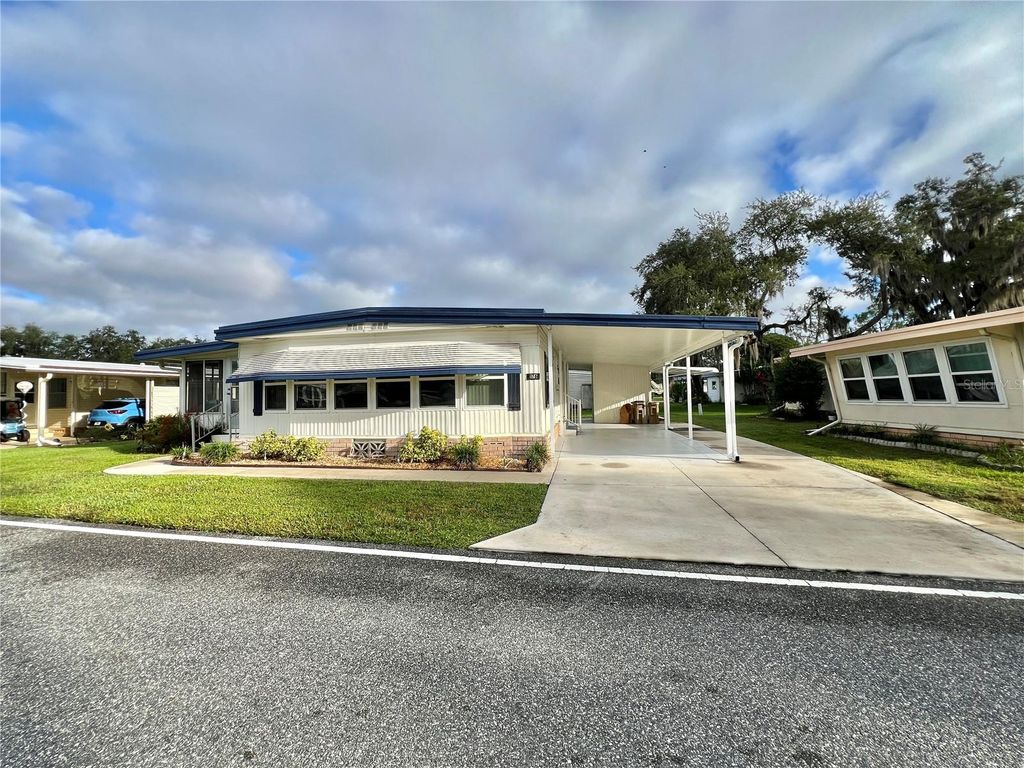 Photo of 176 Azalea Trail, Leesburg, FL 34748 (MLS # G5103794)